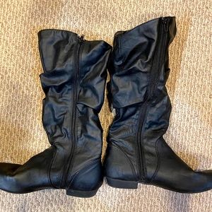 Black leather boots. A couple of marks.